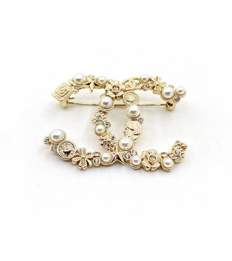 Ch**el brooches